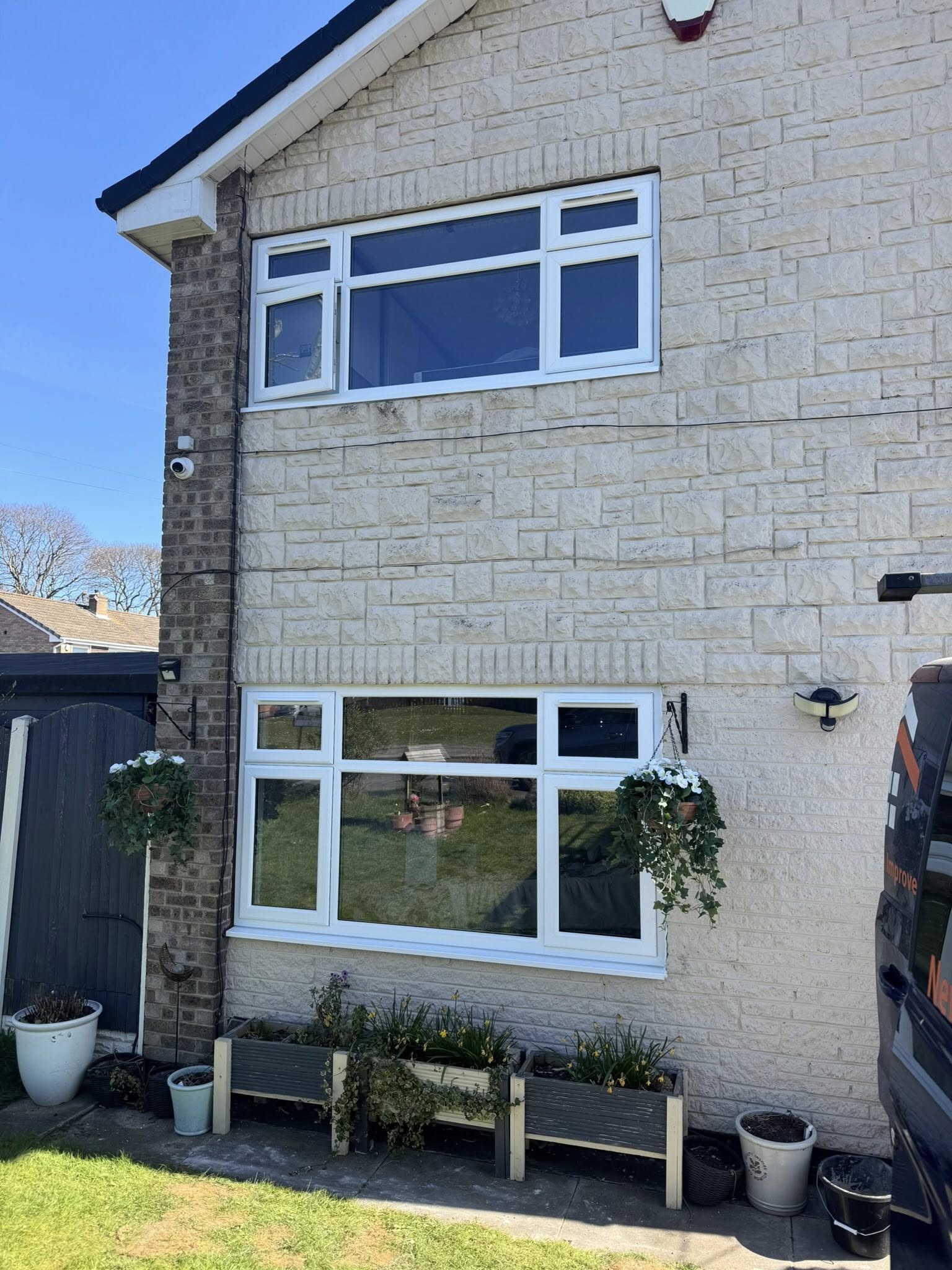 white uPVC windows on both floors of UK home in Doncaster | South Yorkshire